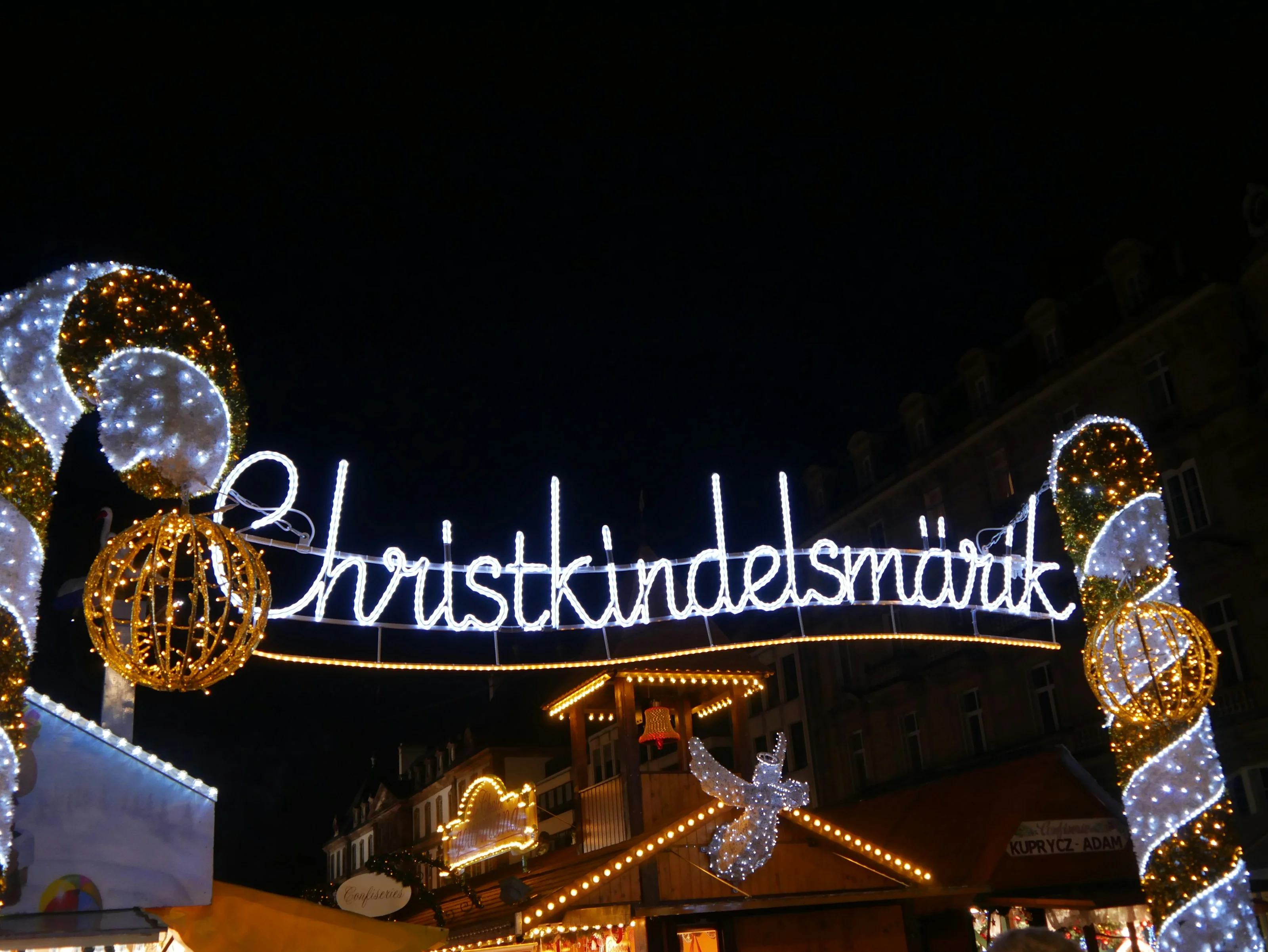 Illuminated Christkindelsmärik sign at Strasbourg's Christmas market